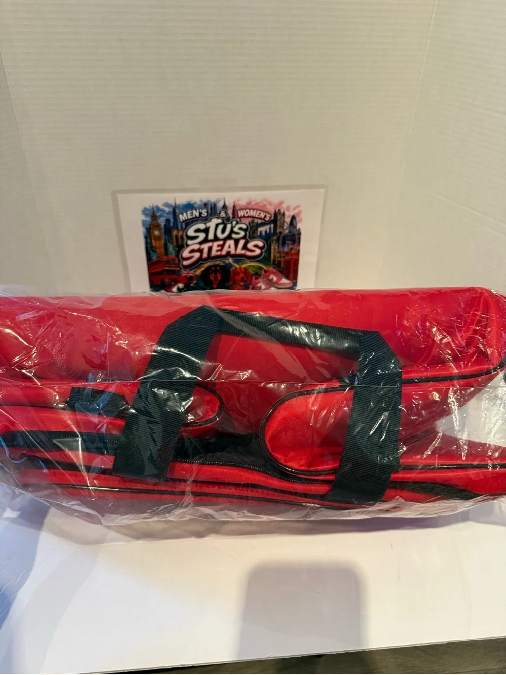Red SNKR Duffel Bag - Stylish Travel Duffel